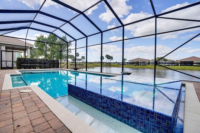 view of swimming pool featuring a water view, glass enclosure, a patio, and a hot tub