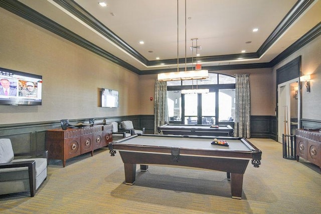 rec room featuring a tray ceiling, ornamental molding, billiards, and light carpet