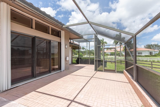 unfurnished sunroom featuring plenty of natural light