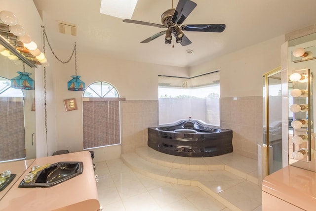 bathroom with sink, tile patterned floors, and ceiling fan