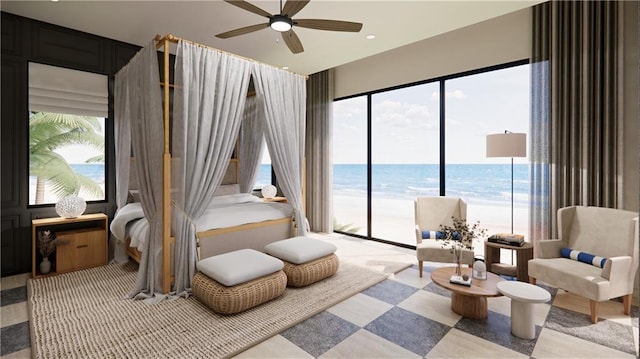 bedroom featuring access to exterior and a water view