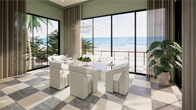 dining area featuring ornamental molding and a water view