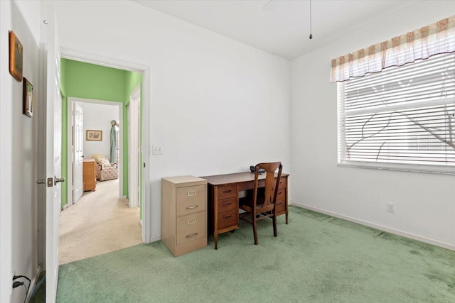 home office with light colored carpet