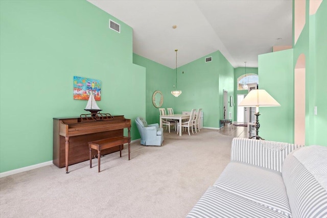 interior space featuring light colored carpet