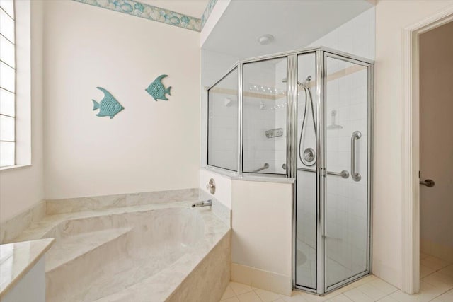 bathroom featuring tile flooring and plus walk in shower