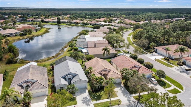 drone / aerial view with a water view