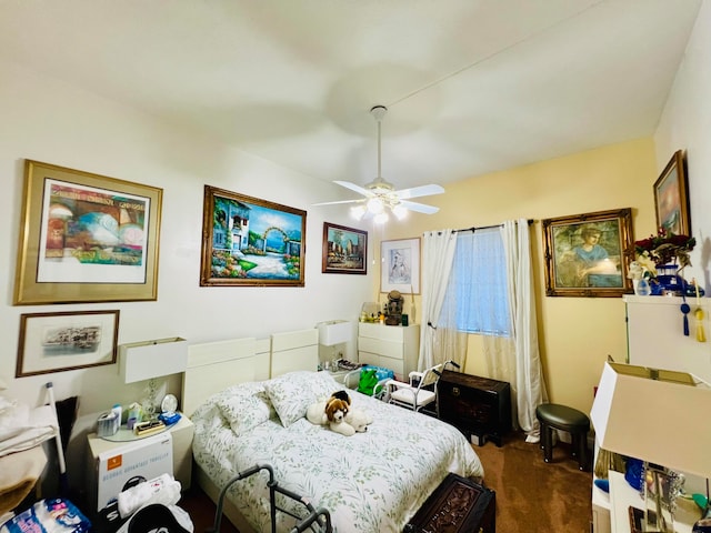 bedroom with dark carpet and ceiling fan