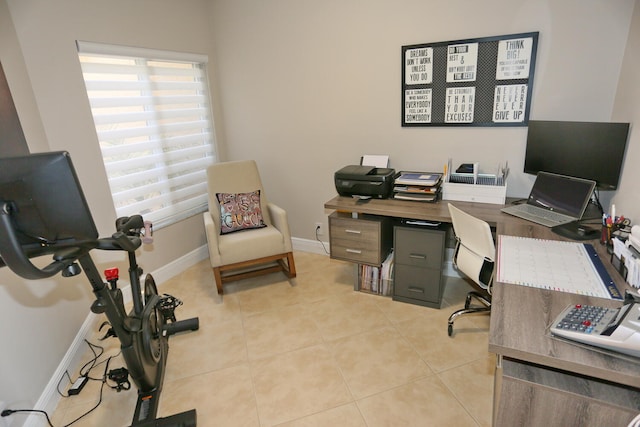 office area featuring light tile floors