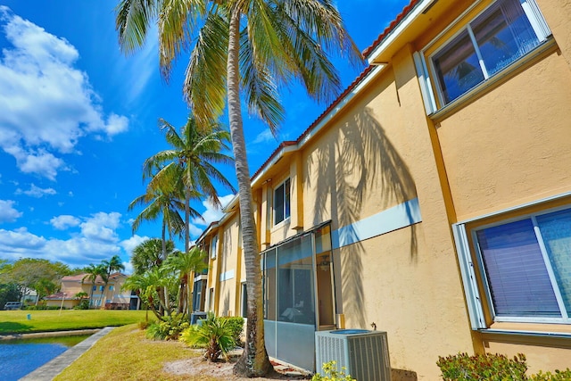 view of property featuring central air condition unit