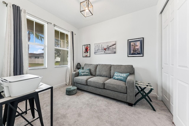 living room with light colored carpet