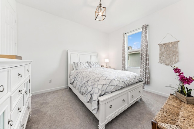 bedroom with light carpet