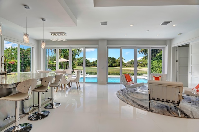 interior space with a wealth of natural light and sink