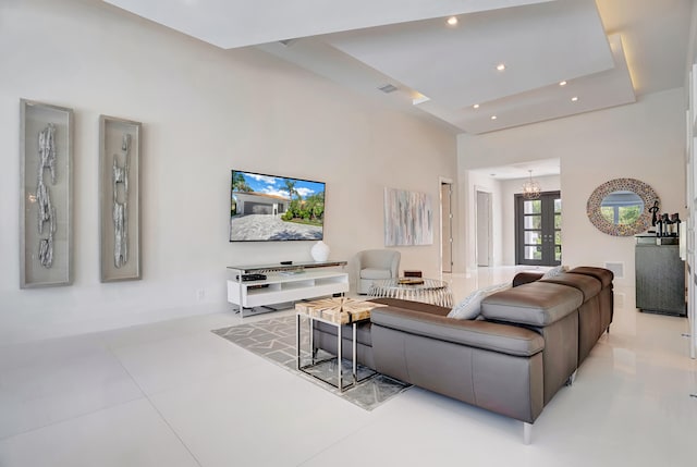 living room with a high ceiling