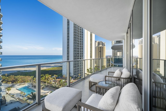 balcony featuring a water view