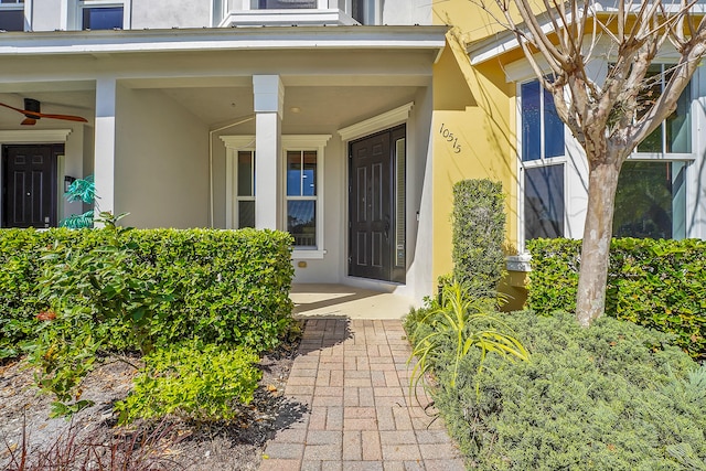 doorway to property featuring covered porch