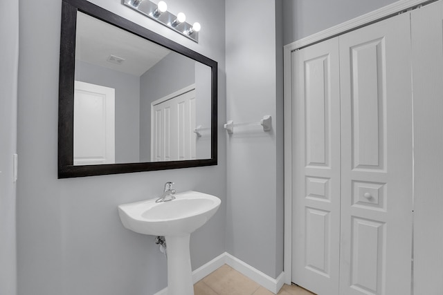 bathroom with tile patterned flooring