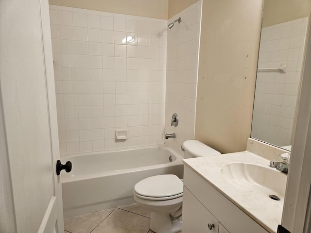 full bathroom with tile patterned flooring, shower / bath combination, vanity, and toilet