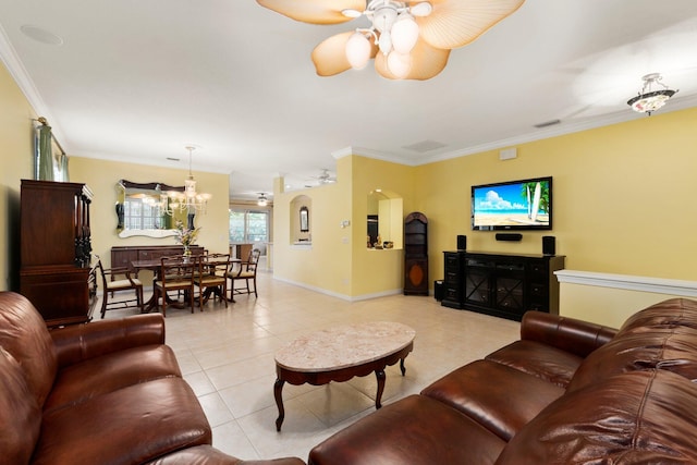 living room with ornamental molding, light tile patterned floors, and ceiling fan