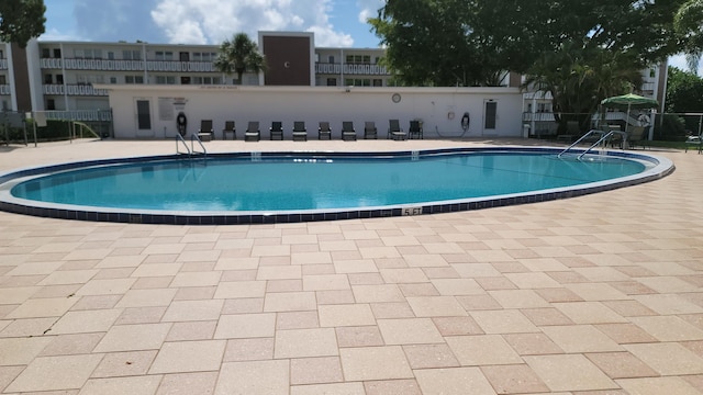 view of pool with a patio