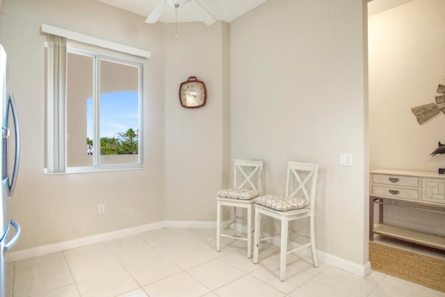 dining room with ceiling fan and light tile patterned floors