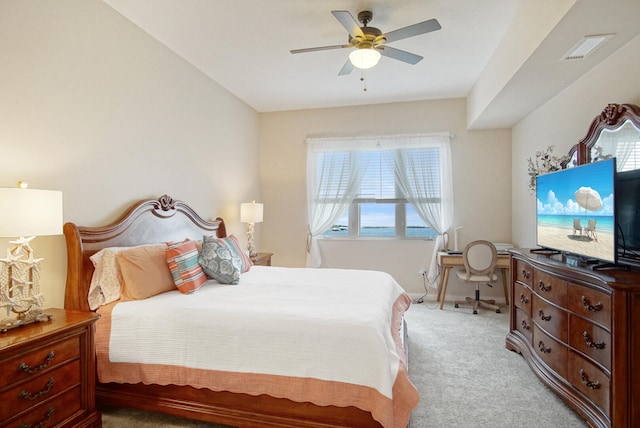 carpeted bedroom with ceiling fan