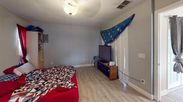 bedroom with light hardwood / wood-style flooring