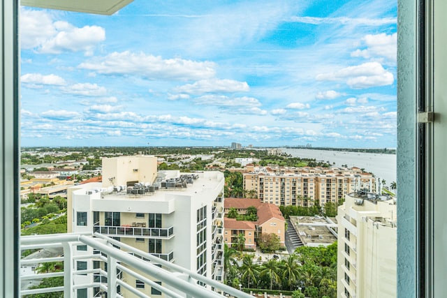 balcony featuring a water view