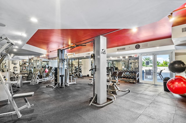 exercise room featuring french doors