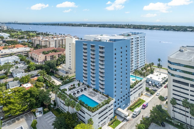 birds eye view of property with a water view