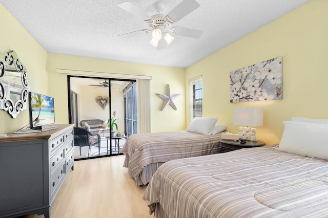 bedroom with access to outside, a textured ceiling, ceiling fan, and light hardwood / wood-style flooring