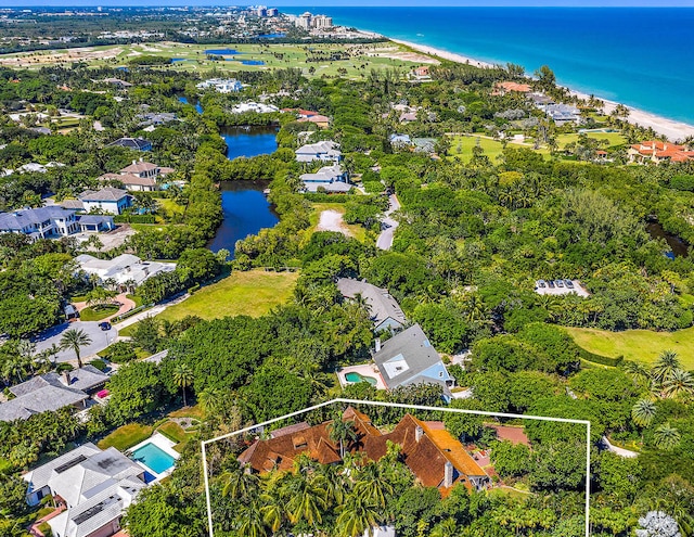 bird's eye view with a water view