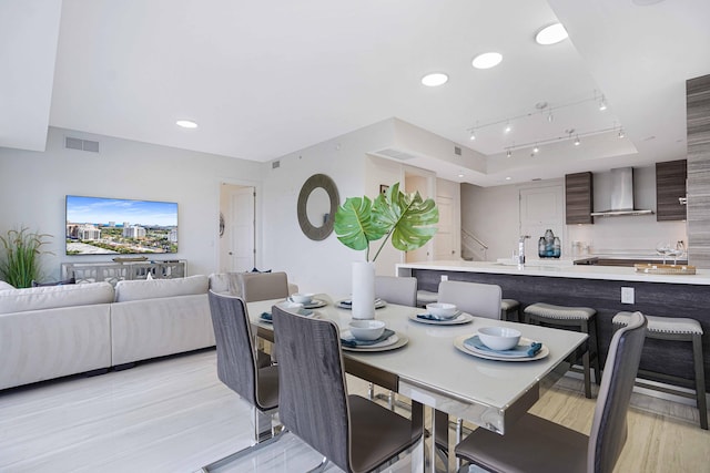 dining space featuring light hardwood / wood-style floors