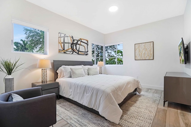 bedroom with light hardwood / wood-style floors