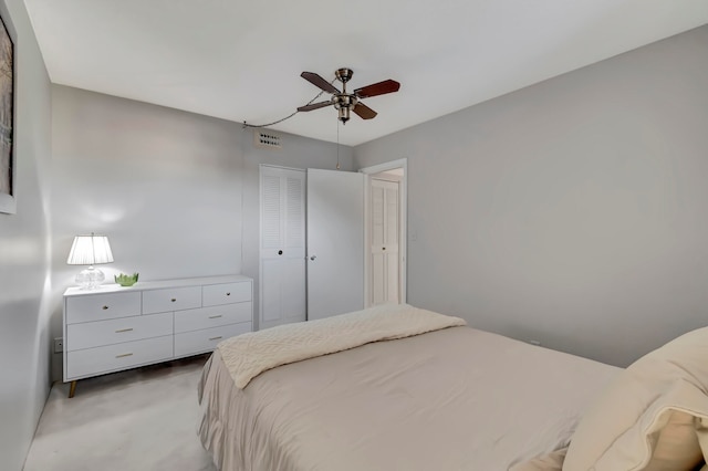 carpeted bedroom featuring ceiling fan