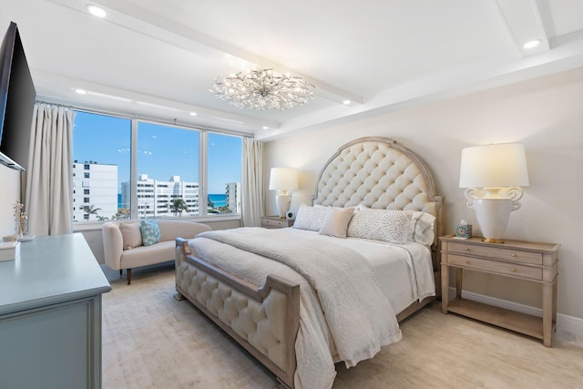 carpeted bedroom with beam ceiling and an inviting chandelier