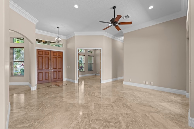 entrance foyer featuring ceiling fan with notable chandelier, light tile floors, a textured ceiling, a towering ceiling, and crown molding