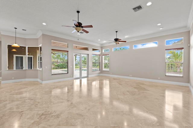 tiled empty room featuring ceiling fan, a textured ceiling, and crown molding