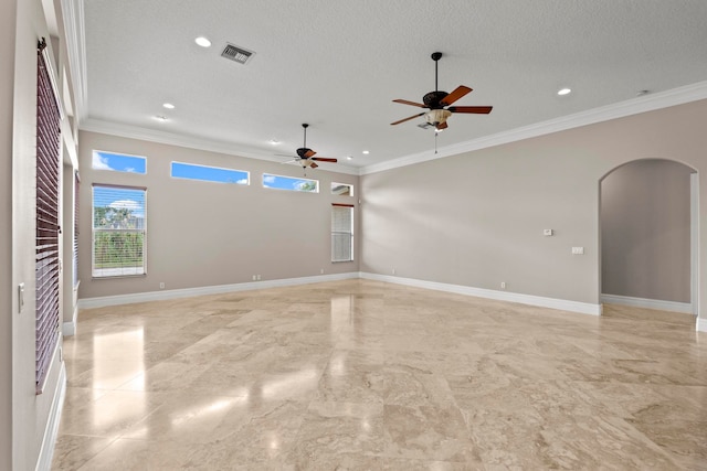 tiled spare room with crown molding, a textured ceiling, and ceiling fan