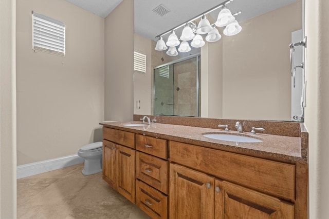 bathroom with double sink vanity, toilet, and tile floors