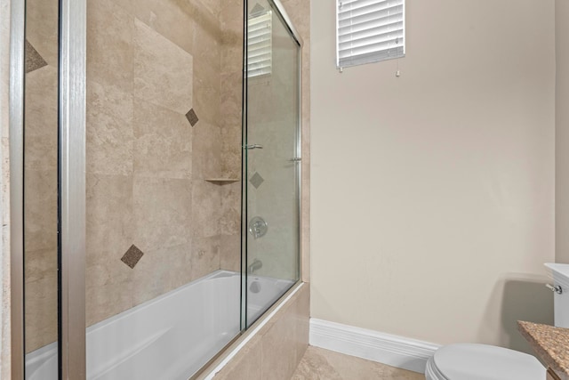 full bathroom with vanity, tile flooring, shower / bath combination with glass door, and toilet