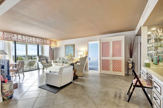 living room with light tile patterned floors