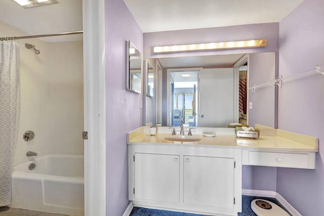 bathroom with vanity and shower / tub combo