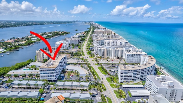 birds eye view of property featuring a water view