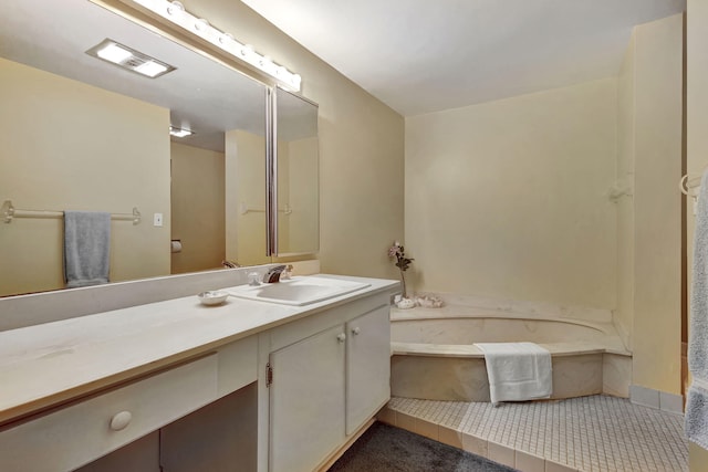 bathroom with vanity and a bathtub