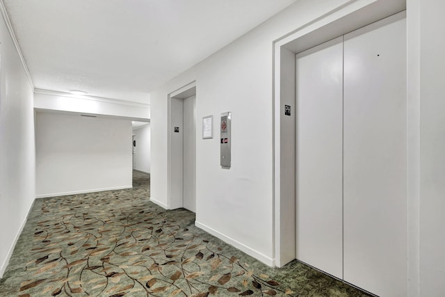 hallway featuring elevator