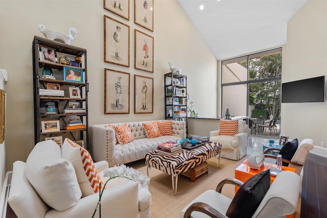 living room featuring high vaulted ceiling