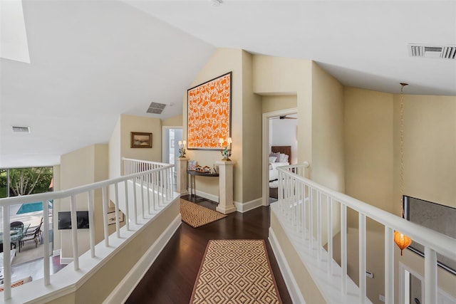 hall featuring dark wood-type flooring