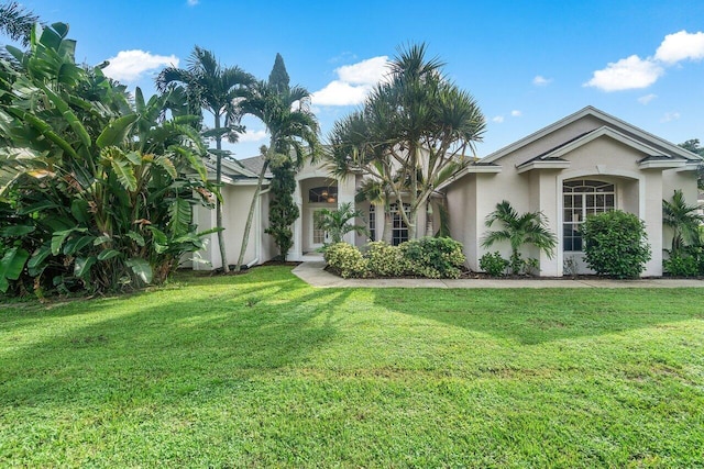 view of front of home with a front yard