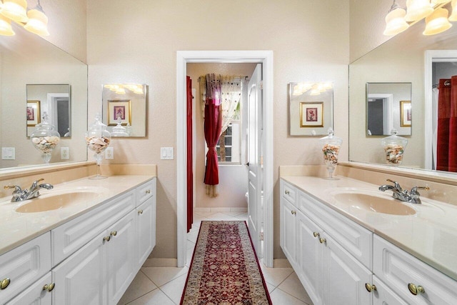 bathroom with vanity and tile patterned flooring