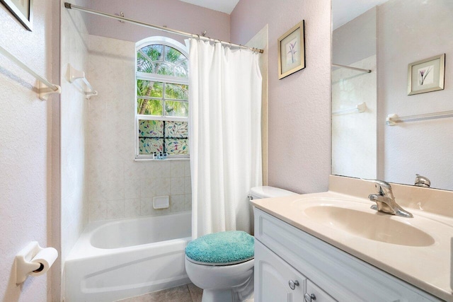 full bathroom featuring vanity, toilet, tile patterned floors, and shower / bath combo